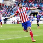 Diego Costa marcó el segundo gol del Atlético y lo celebró con los brazos abiertos. Detrás, Gabi, Raúl García y Arda corren a celebrarlo con él