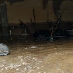 Imagen de un garaje inundado en Valencia.
