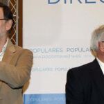 El presidente del Gobierno, Mariano Rajoy y el candidato del PP a las elecciones europeas, Miguel Arias Cañete.
