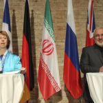 El ministro de Exteriores iraní, Mohamed Yavad Zarif, y la responsable de la política exterior de la UE, Catherine Ashton
