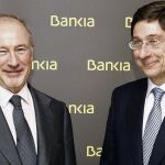 José Ignacio Goirigolzarri (d), junto a su antecesor como presidente de Bankia, Rodrigo Rato.