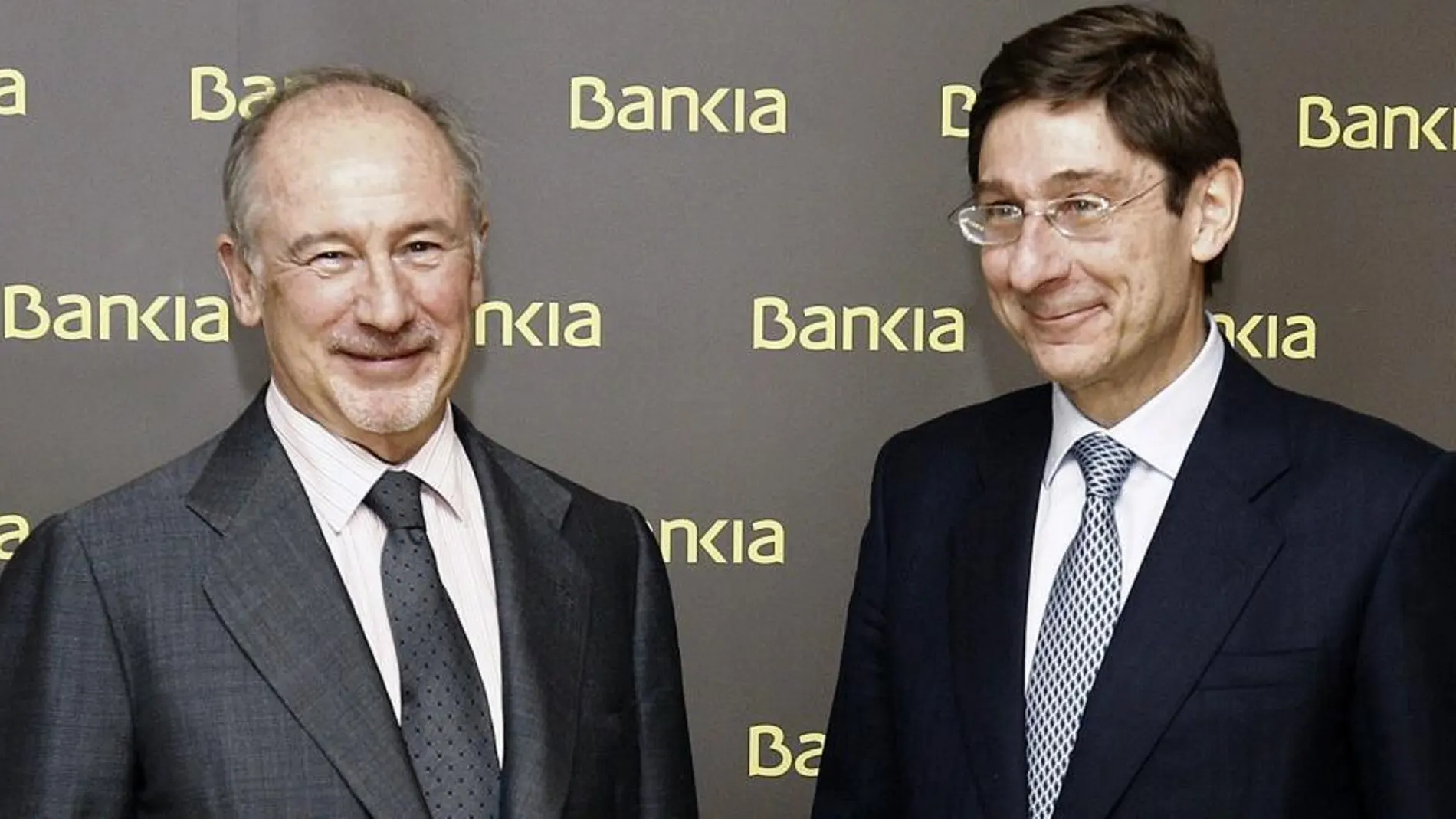 José Ignacio Goirigolzarri (d), junto a su antecesor como presidente de Bankia, Rodrigo Rato.