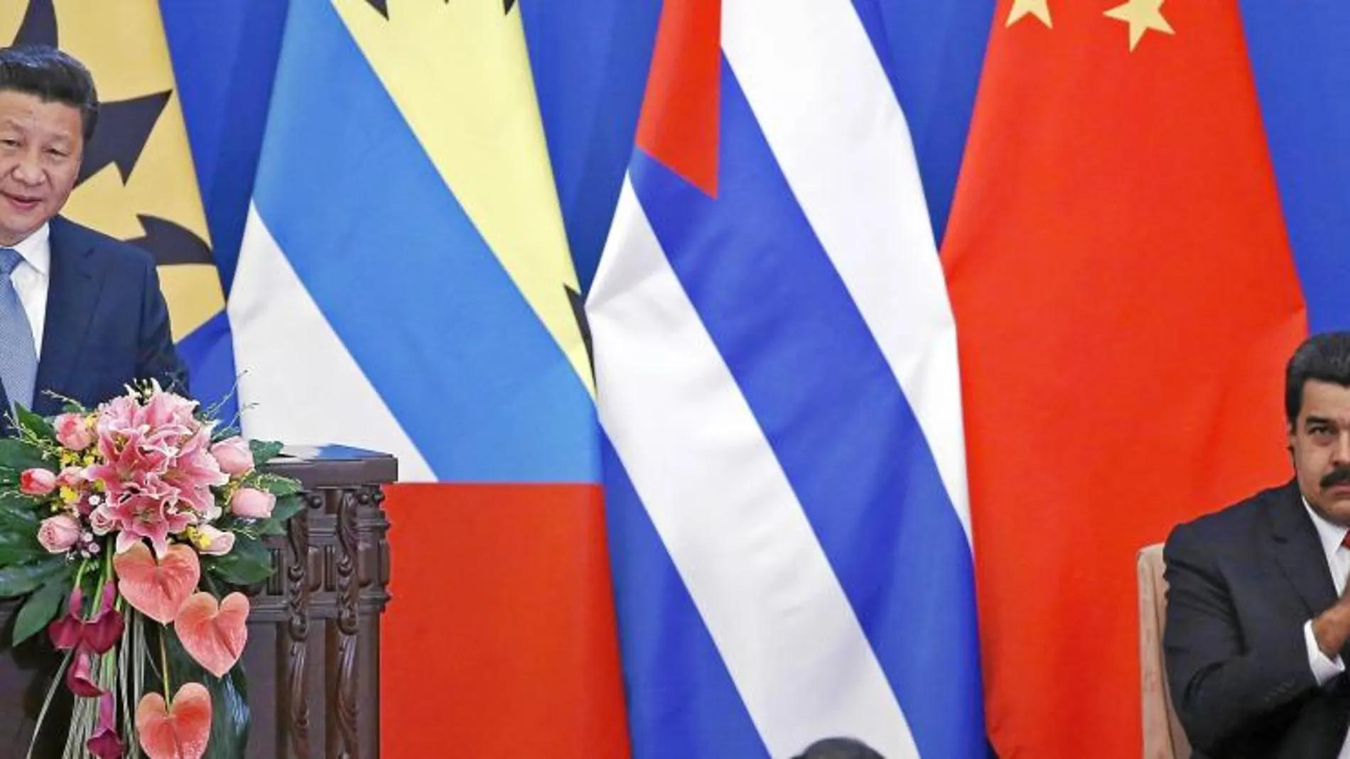 El presidente chino, Xi Jinping, en su discurso del I foro Ministerial con la CELAC, junto al presidente venezolano, Nicolás Maduro, ayer