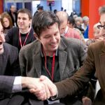 Jaume Collboni y Jordi Martí se dan la mano en el congreso donde Jordi Hereu dio el relevo al actual presidente del grupo municipal del PSC