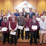 Los empleados reconocidos, junto al consejero de Transportes y al consejero delegado de Metro de Madrid