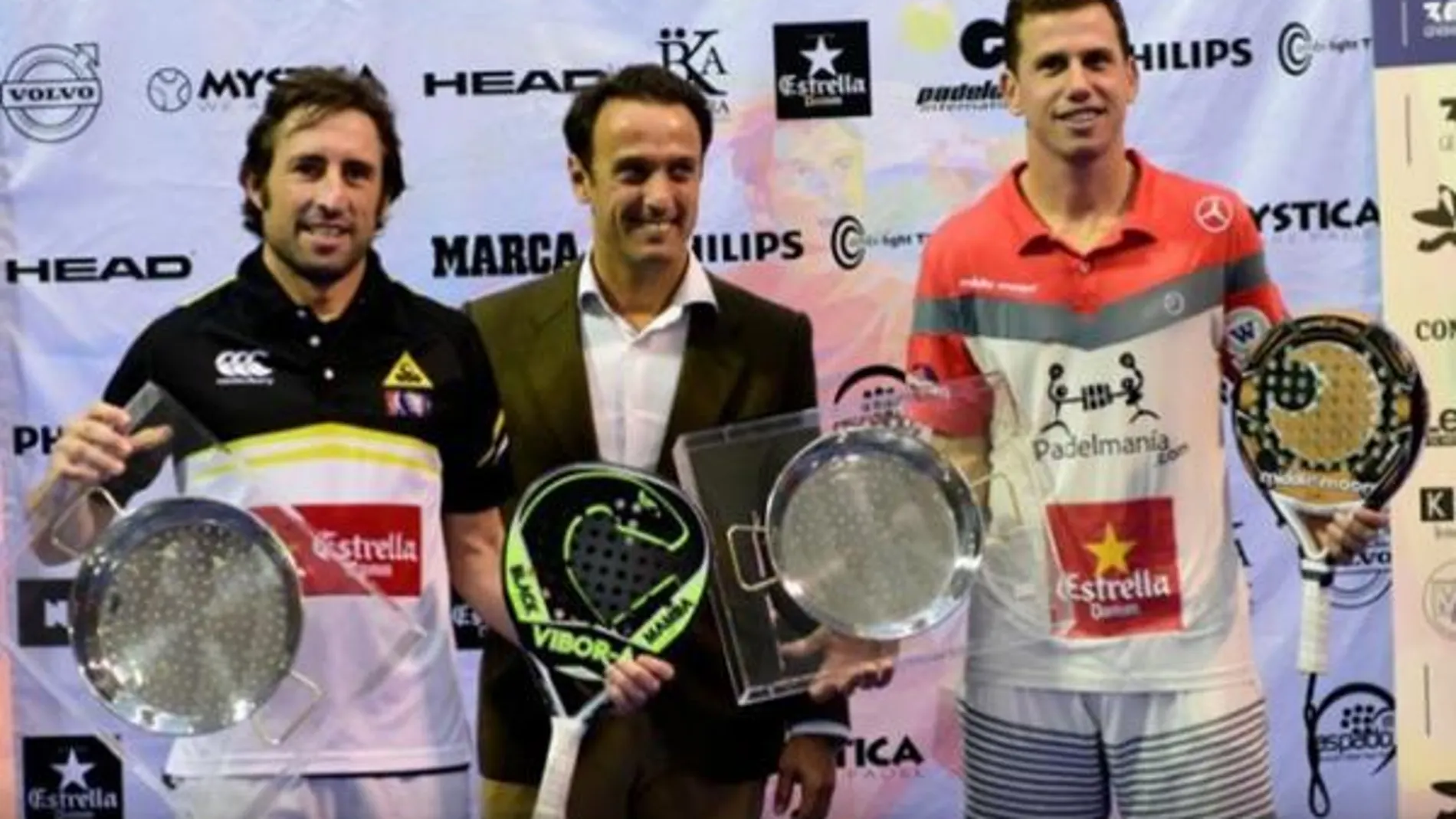 Maxi Grabiel y Paquito Navarro, con el título en Valencia.