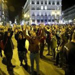 Miembros del movimiento 15M, durante su grito silencioso en la madrileña Puerta del Sol