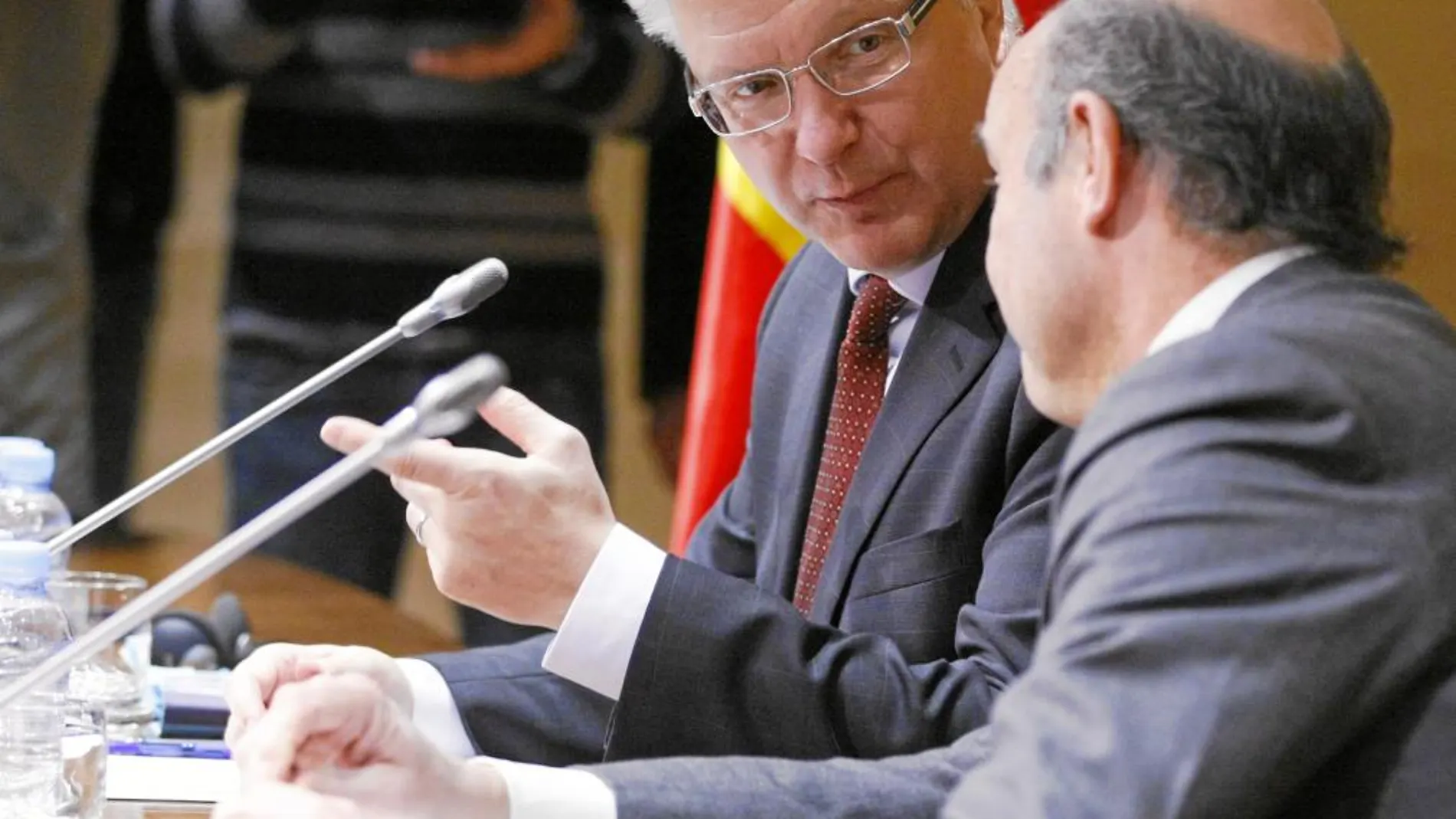 Olli Rehn y Luis de Guindos coinciden en que en 2013 se dará la vuelta a la economía