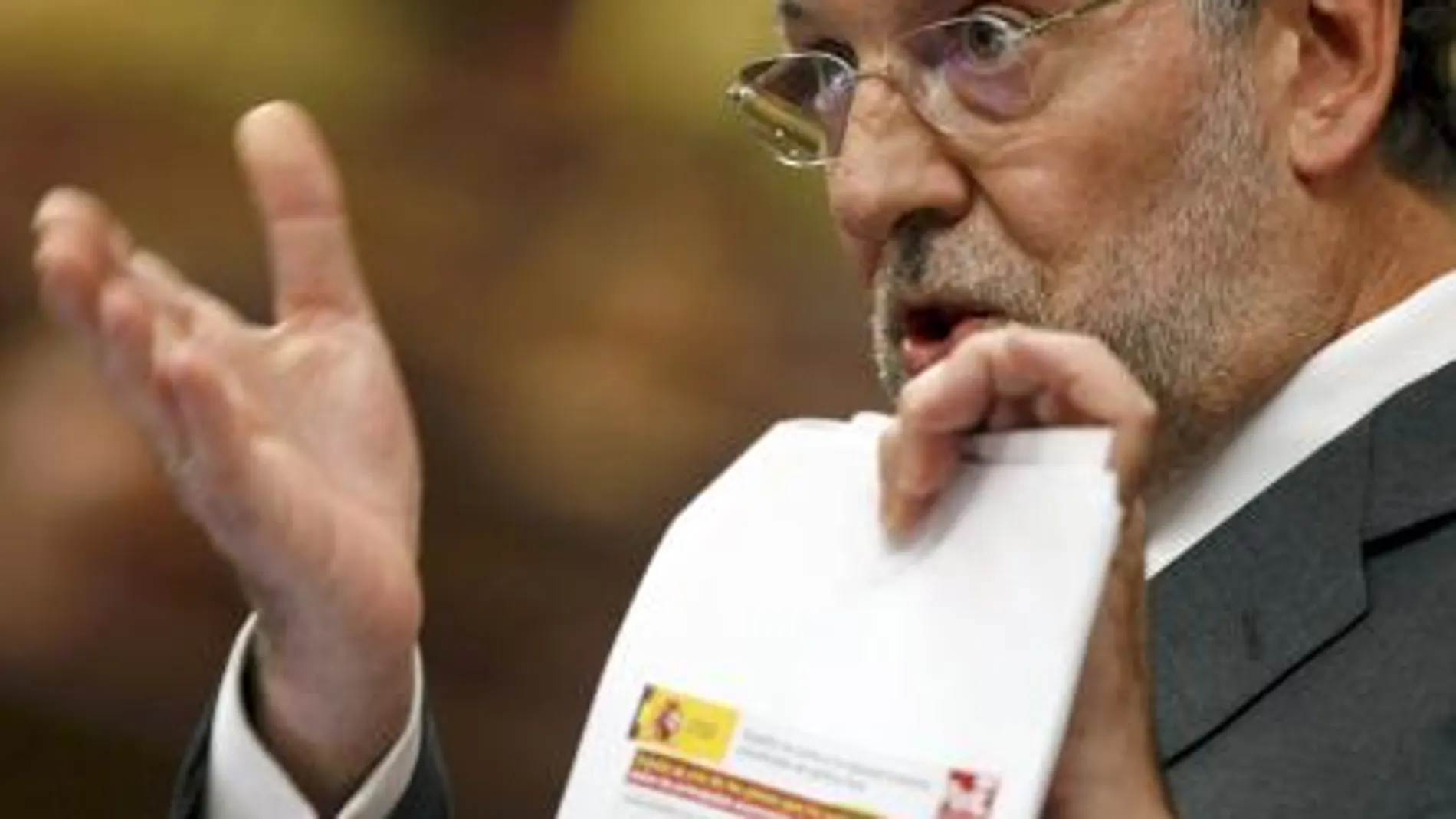 El líder del PP, Mariano Rajoy, durante su intervención en el debate