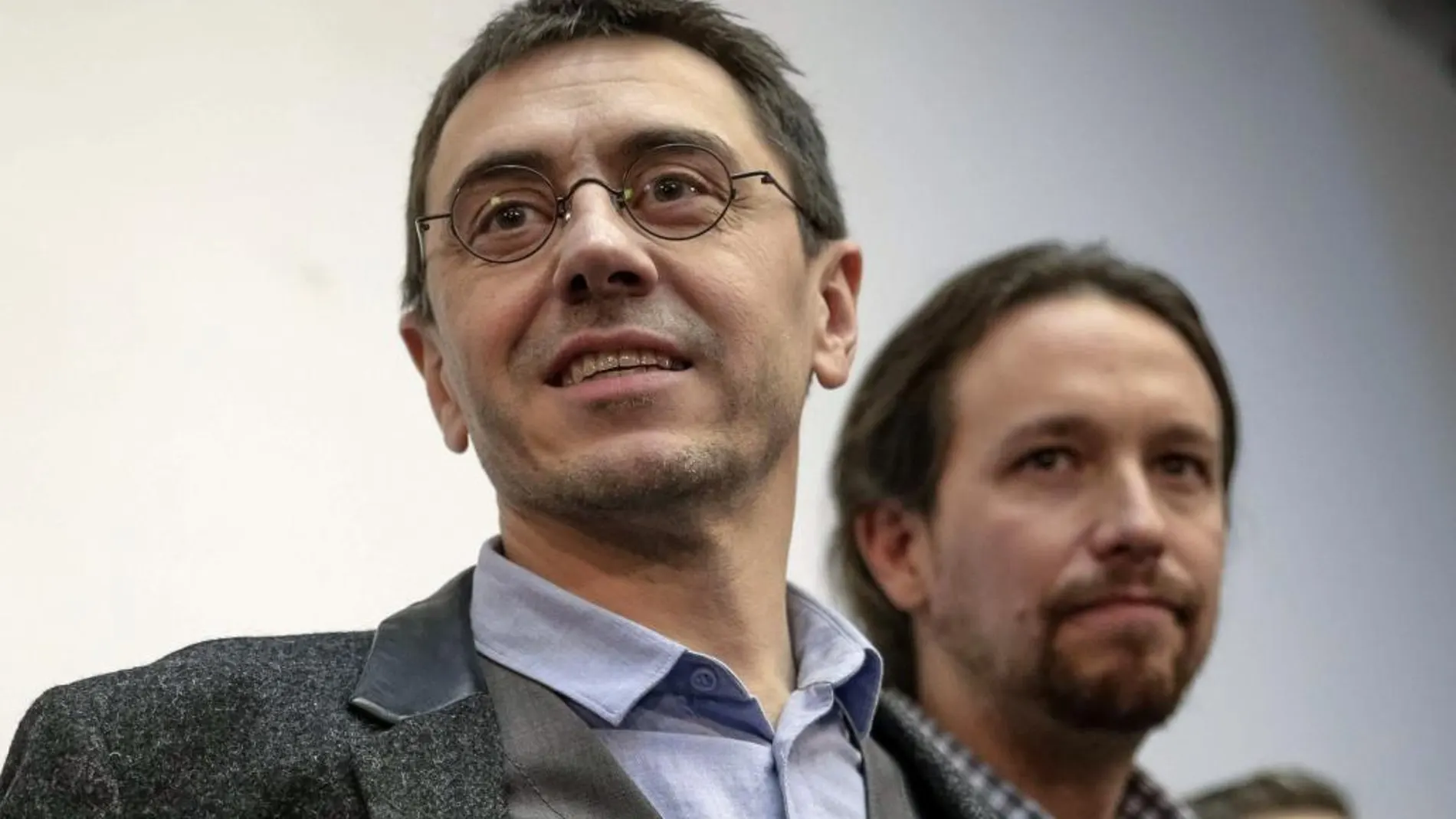 Juan Carlos Monedero junto al secretario general del partido, Pablo Iglesias.