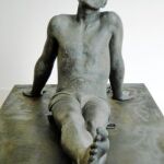 En la gráfica, bajo el título «Endimion» muestra la figura relajada de un nadador tras el baño.