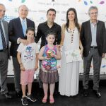 El presidente de la Fundacción Bancaria de La Caixa, Isidro Fainé, y el jugador del Barça Xavi presentaron la ampliación del nuevo centro