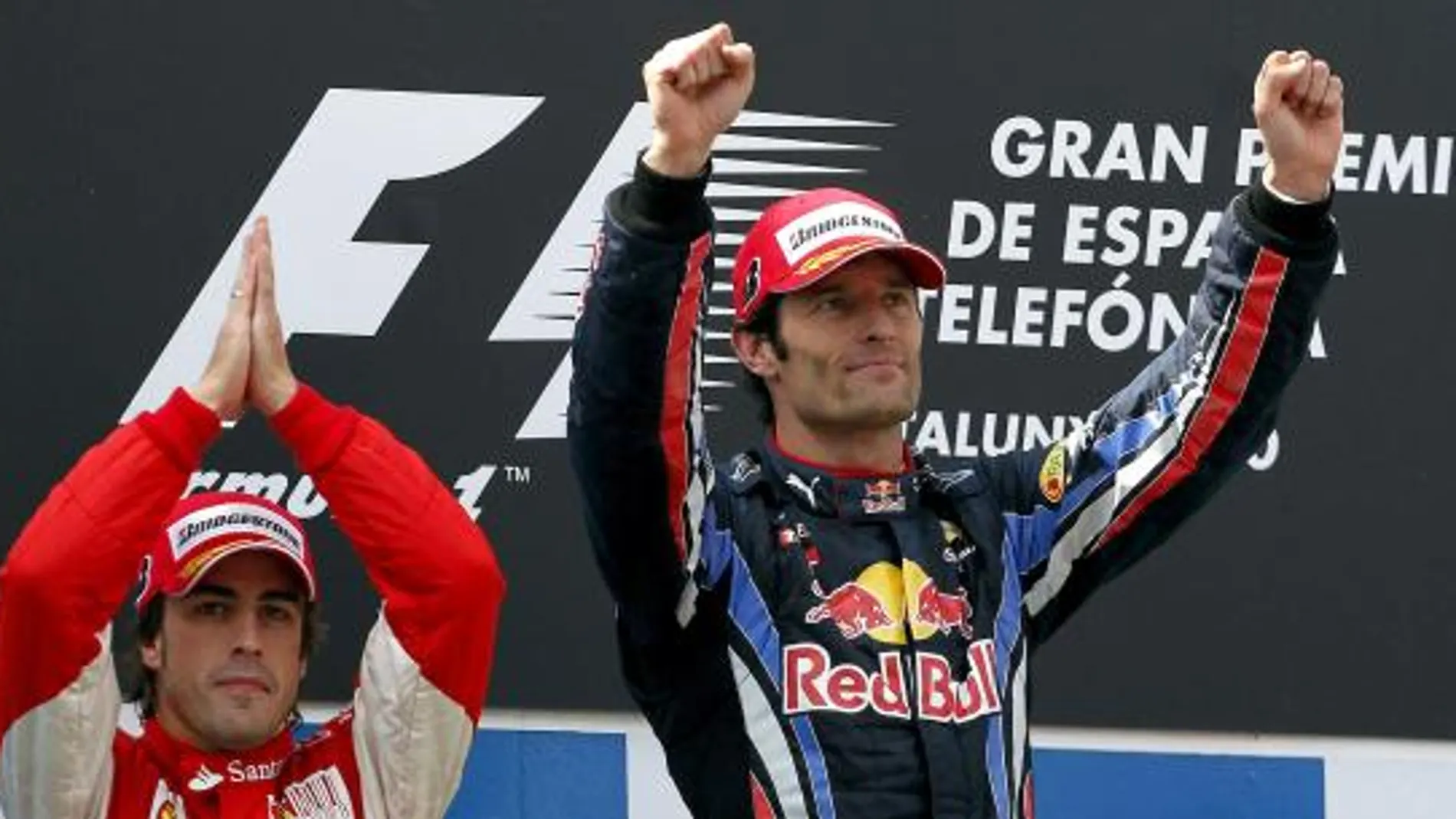 Fernando Alonso con Webber