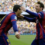 Luis Suarez y Leo Messi celebran un gol con el Barcelona