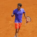 El suizo Roger Federer celebra un punto contra el francés Gael Monfils