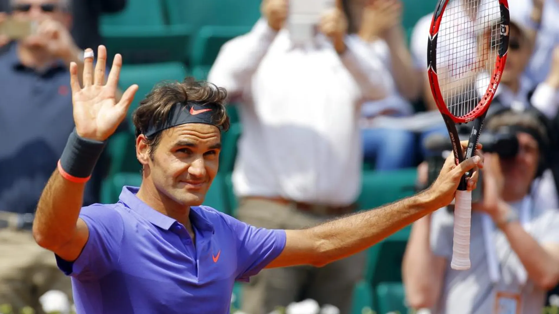 El suizo Roger Federer celebra su victoria sobre el español Marcel Granollers