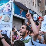 Duras protestas en Alejandría contra la represión policial en las que se mostraron fotos de Khaled Said