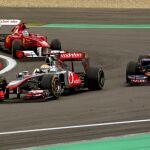 Hamilton, Webber y Alonso, en un momento de la carrera en Nürburgring