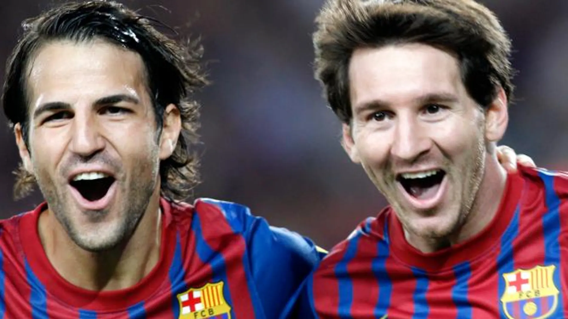 Cesc Fabregas y Lionel Messi