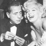 Bacall, Bogart y Monroe durante el estreno de "Cómo casarse con un millonario", en 1953