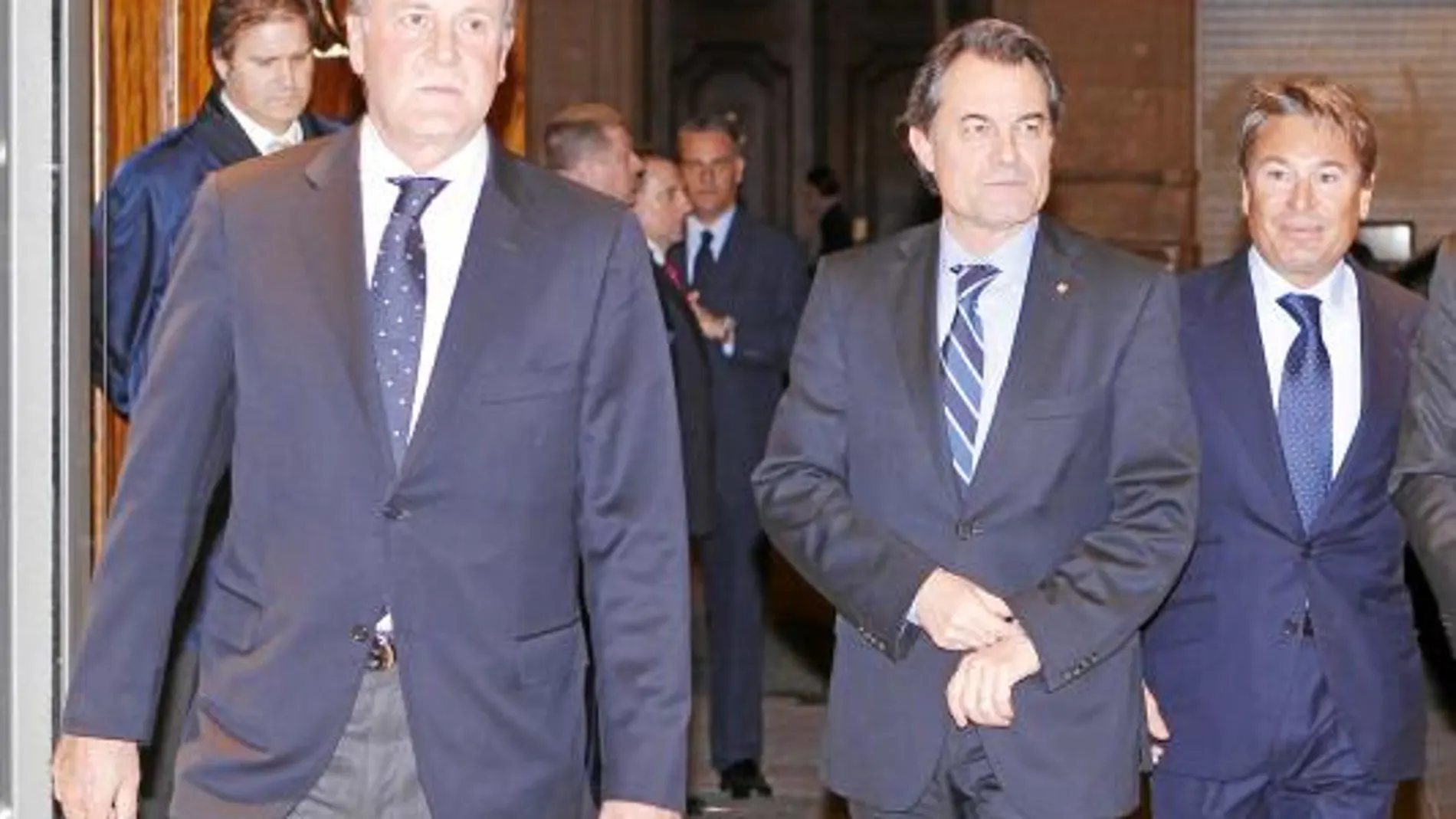 Los empresarios Enrique Lacalle y Manuel Torreblanca con Artur Mas