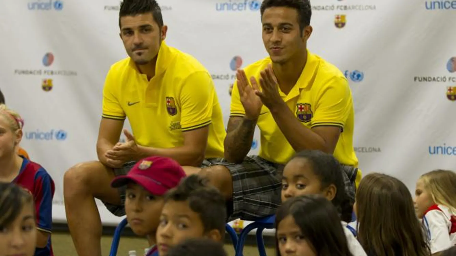Villa y Thiago acudieron ayer a un acto del Barcelona con UNICEF