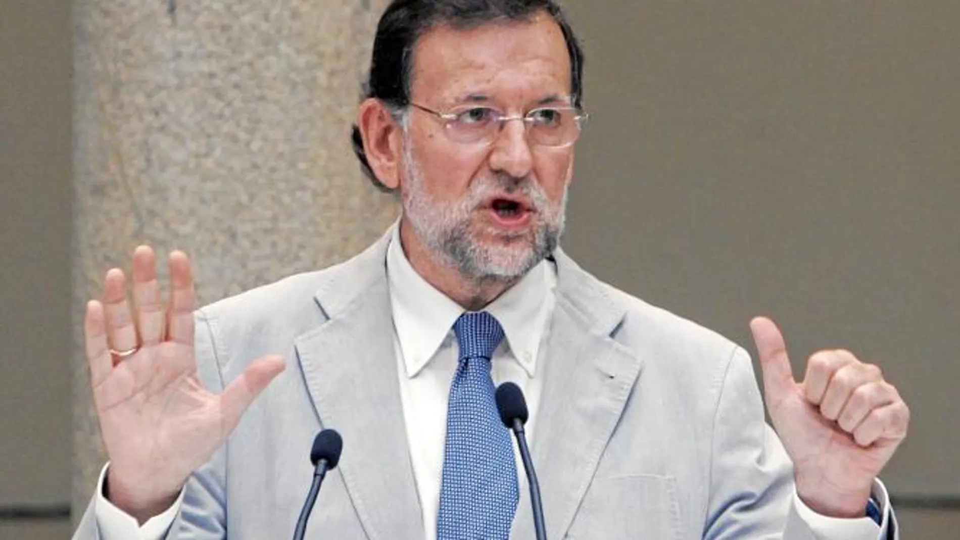 El presidente del PP, Mariano Rajoy, ayer, durante su intervención en un acto en Santiago de Compostela