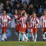 Los jugadores del Almería, celebran el tercer gol del equipo marcado por el delantero sueco Henok Goitom (c)