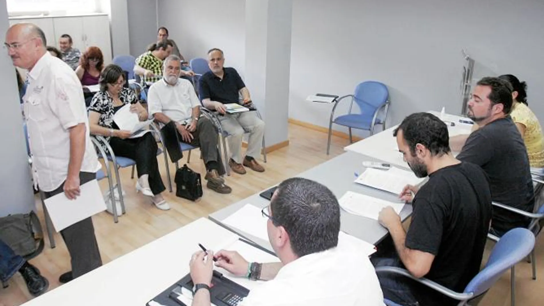 Medrano, Torrijos y García, sentados en primera fila