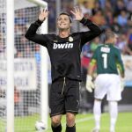 Cristiano celebra uno de sus goles al Málaga