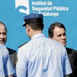 El conseller de Interior, Felip Puig, y el president de la Generalitat, Artur Mas, junto a Mossos d'Esquadra en un acto
