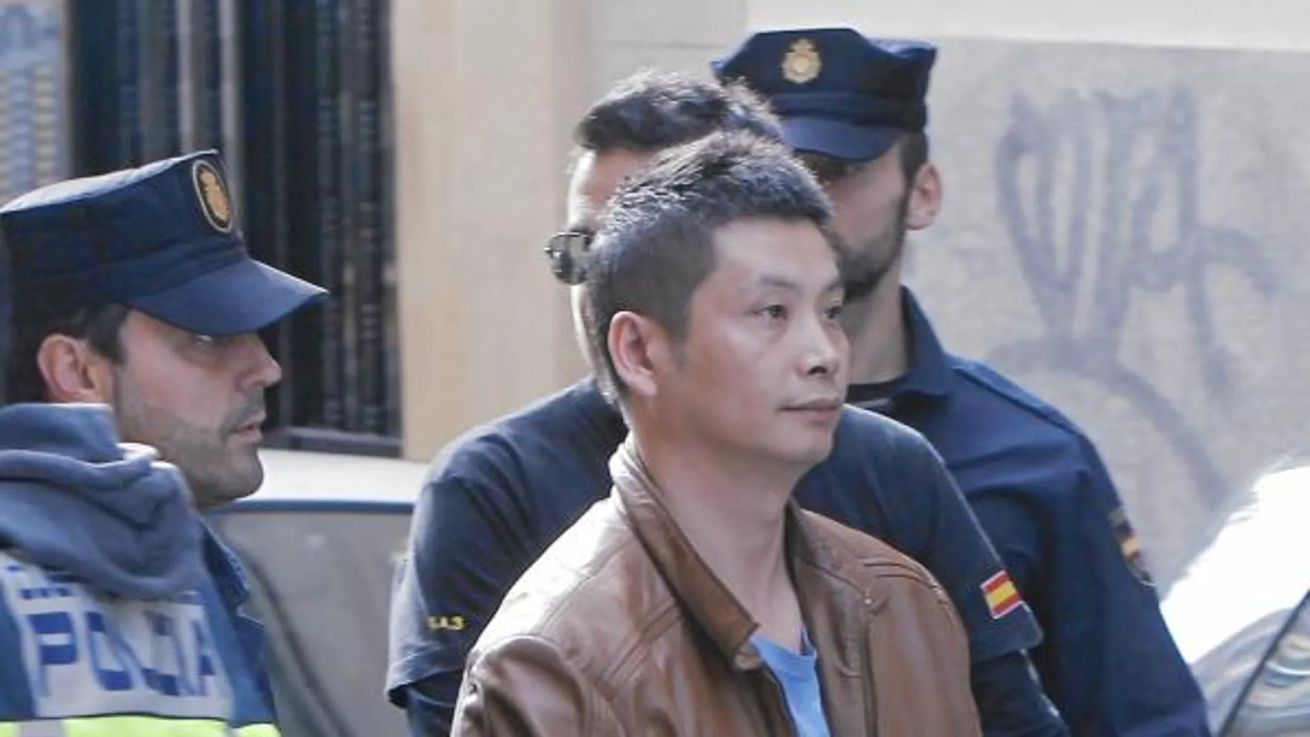 El instructor considera a Gao Ping, en la imagen al ser detenido detenido, el "líder absoluto" de la supuesta organización criminal