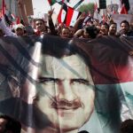 Retrato de Bachar al Asad en una manifestación en favor del régimen sirio