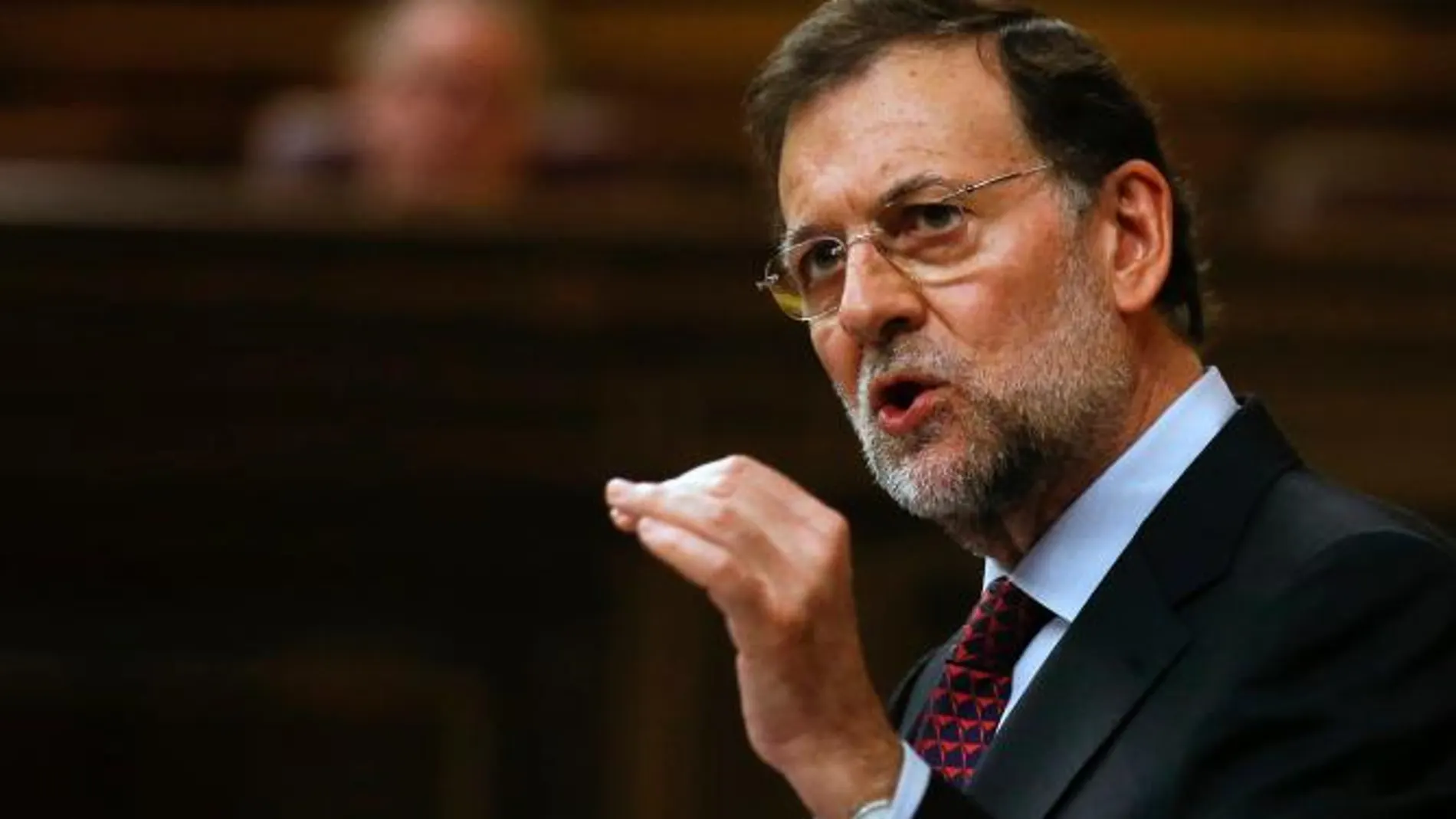 Rajoy: «La economía comenzará a crecer en 2014 y bajaremos los impuestos»