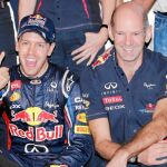 El director técnico del equipo Red Bull celebra junto a Vettel la victoria del alemán la semana pasada en Japón