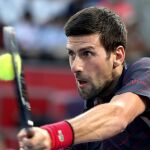 Djokovic golpea un revés ante Go Soeda