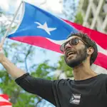 Varios jóvenes puertorriqueños han protestado durante dos semanas para propiciar la caída del gobernador