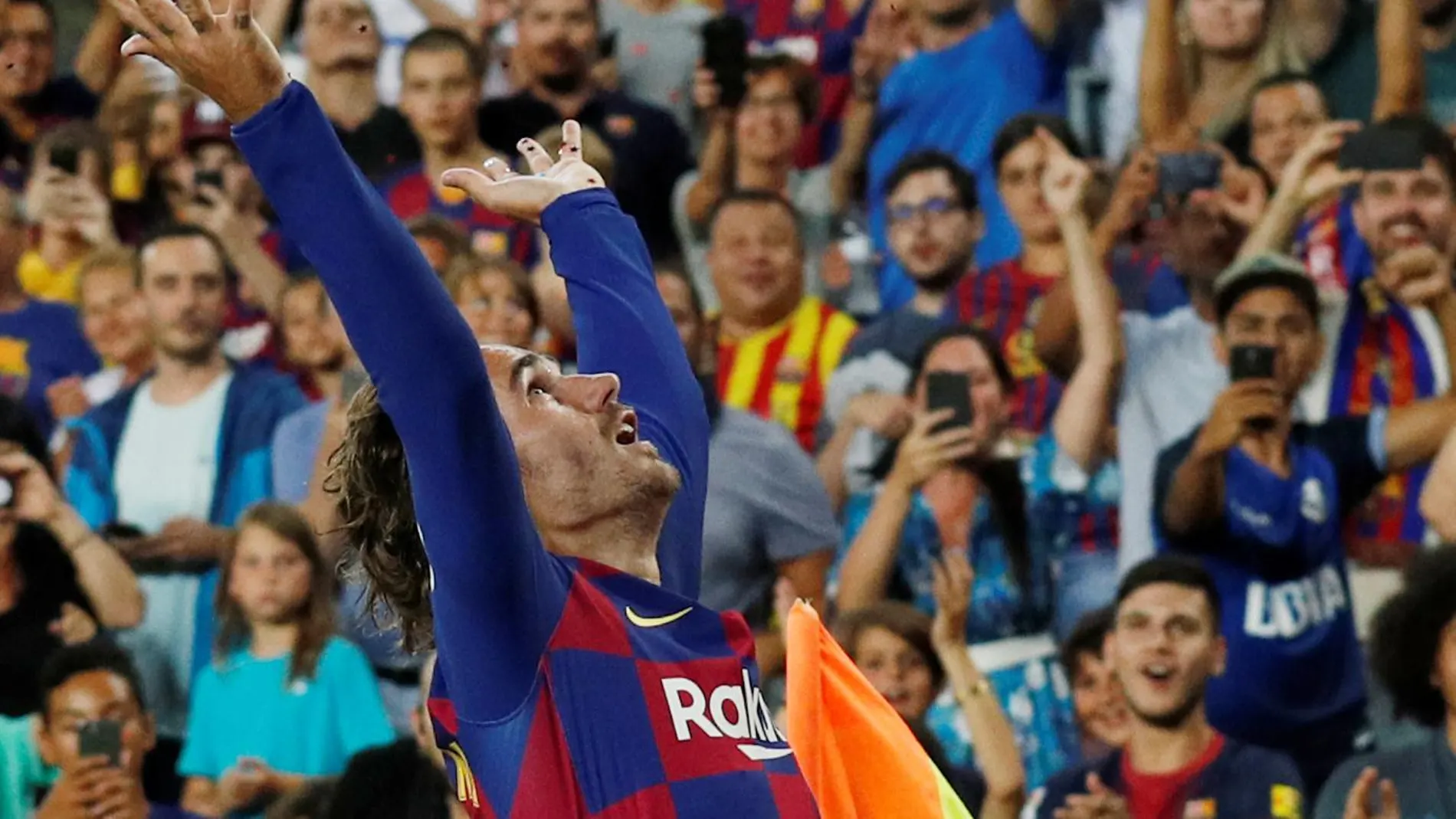 [- August 25, 2019 Barcelona's Antoine Griezmann celebrates scoring their second goal REUTERS/Albert]
