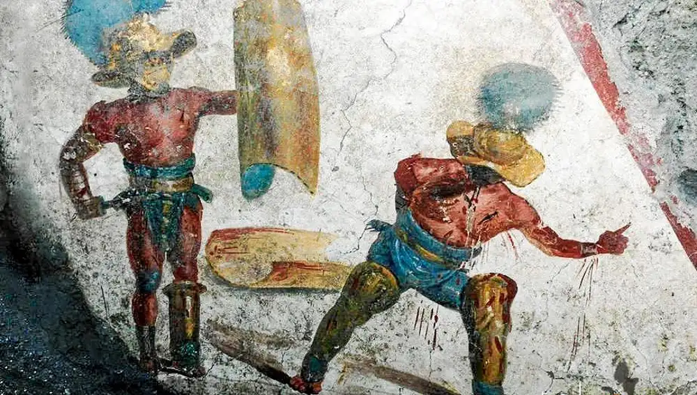 El fresco hallado en Pompeya, de un metro de alto y metro y medio de ancho, representa a dos gladiadores en pleno combate en la arena. Foto: Parque Arequeológico de Pompeya