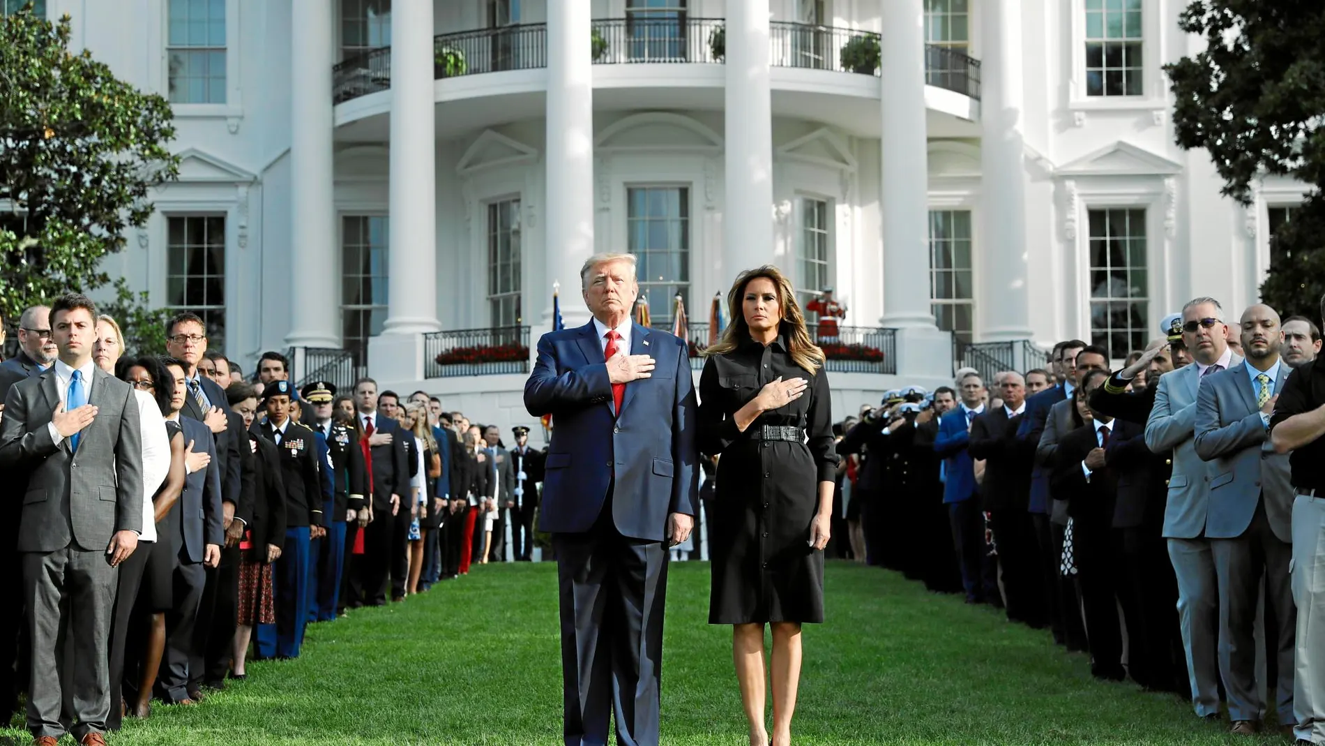 Donald Trump y la primera dama, Melania, en un momento ayer del homenaje a las víctimas del 11-S