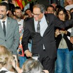 Torrent Y Torra junto a los manifestantes en el primer aniversario del referéndum ilegal del 1-O