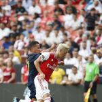 [Mesut Ozil (10) battle for the ball during the first half of a match in the International Champions Cup]