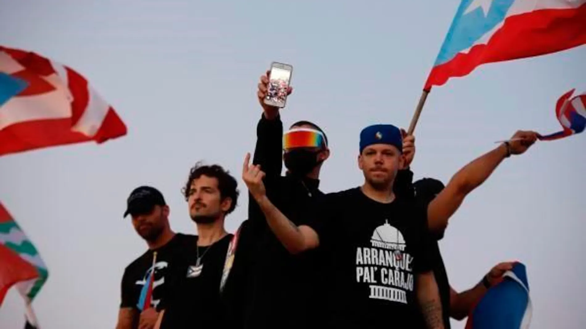 Los cantantes puertorriqueños Ricky Martin, Tommy Torres, Bad Bunny y Residente en una protesta en San Juan contra el gobernador/Efe