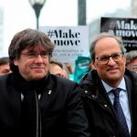 Carles Puigdemont y Quim Torra en un acto de protesta en Bélgica
