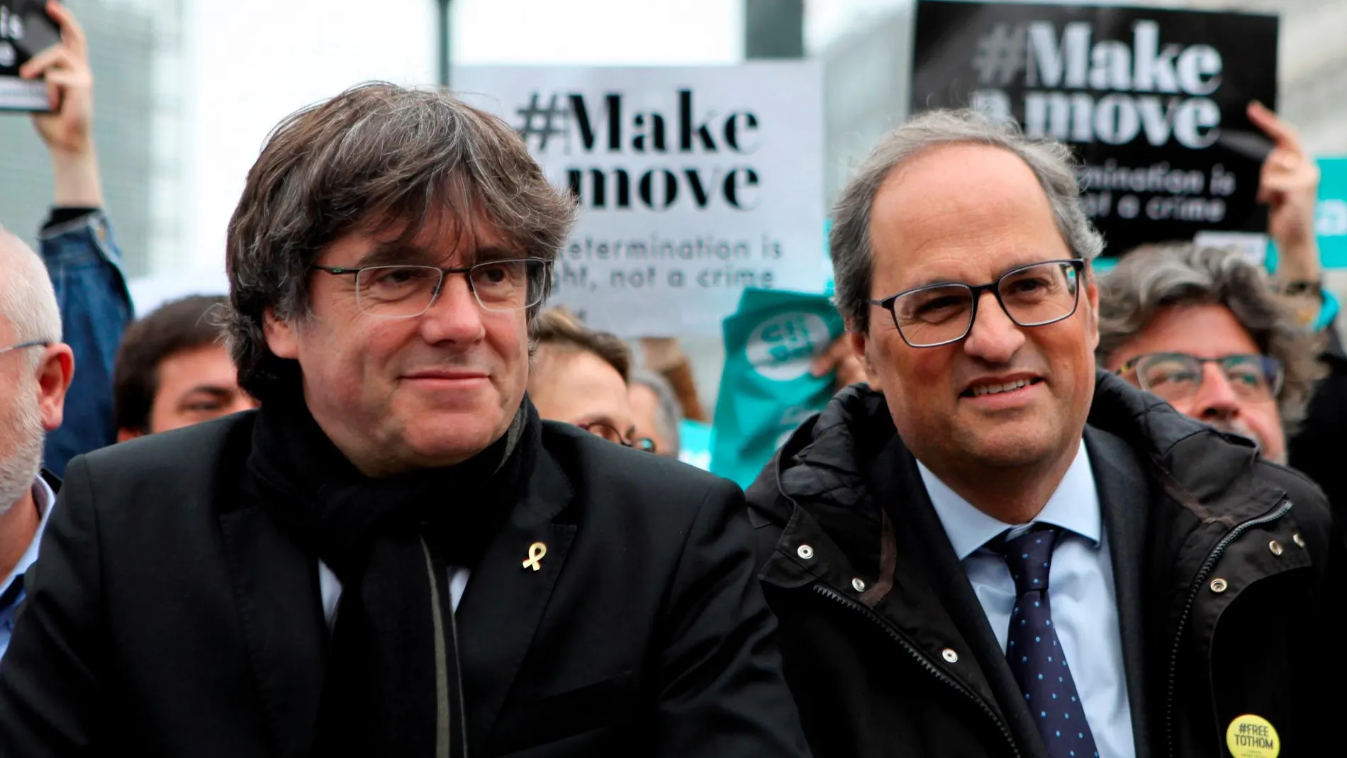 Carles Puigdemont y Quim Torra en un acto de protesta en Bélgica