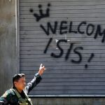 Pintada que reza “Bienvenido Isis”