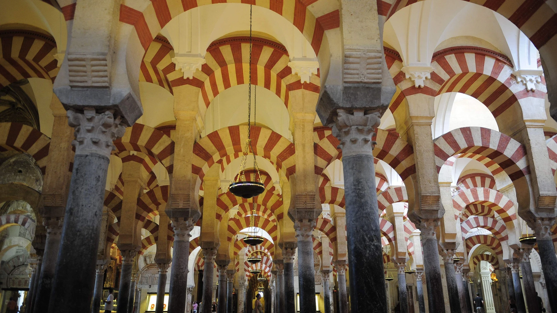 Tourists visit the Great Mosque of Cordoba in southern Spain, Thursday, Aug. 6, 2009. (AP Photo/Manu Fernandez)