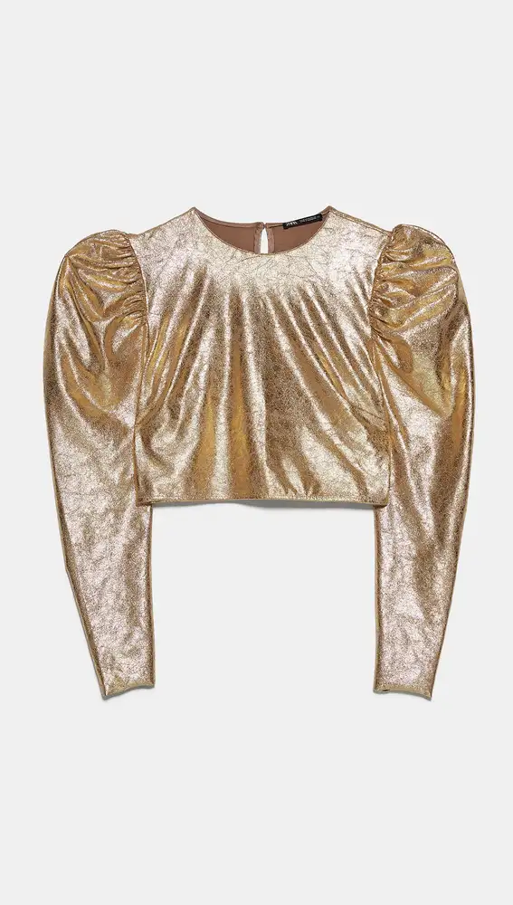 Blusa estilo cropped dorada de Zara