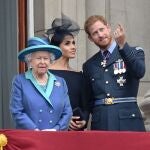 Queen Elizabeth II , with Prince Harry and Meghan Markle during the RAF Centenary at BuckinghamPalace, London