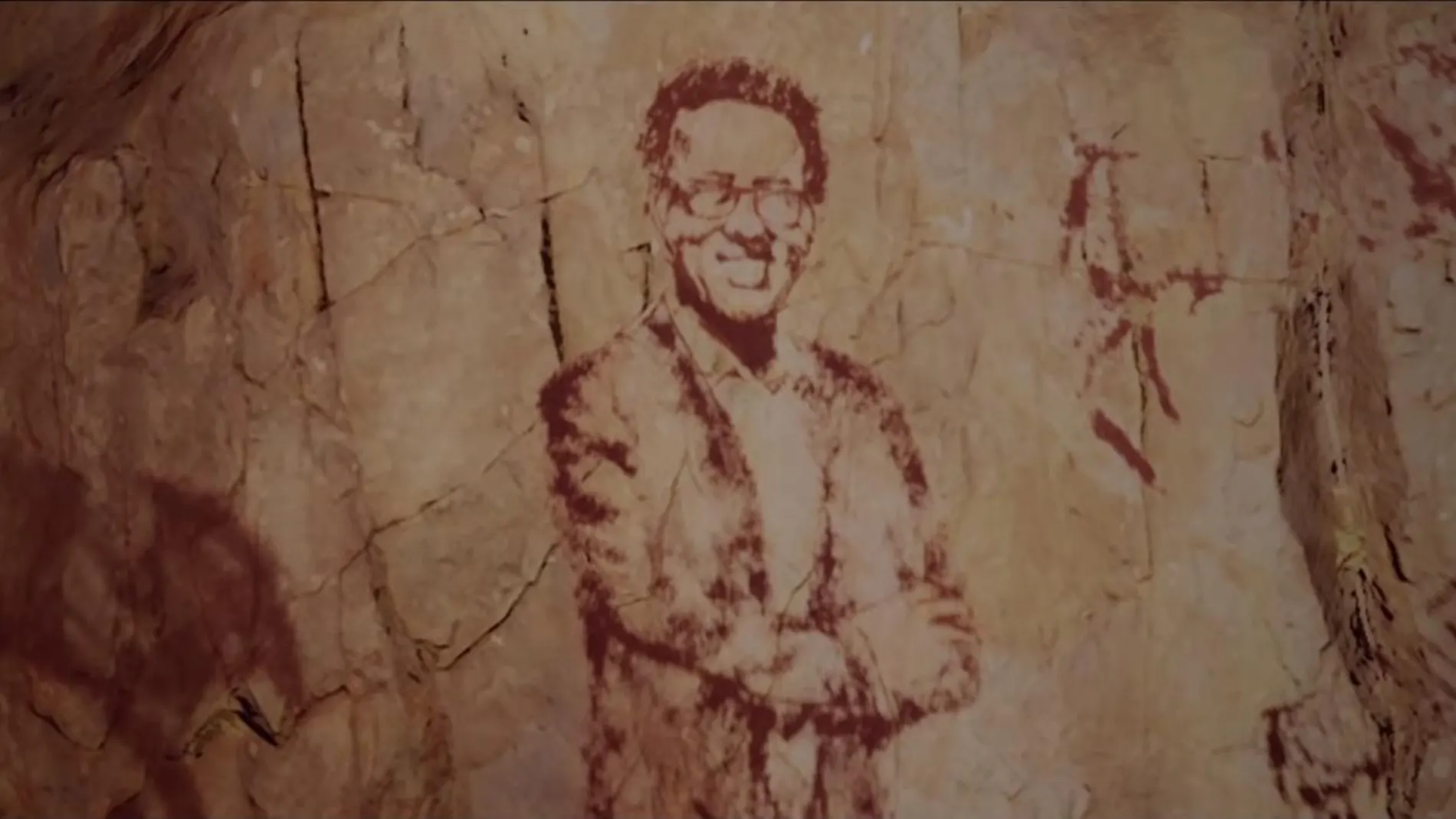 Fotograma del anuncio de Navidad de Campofrío en el que la figura de Jordi Hurtado aparece como una pintura rupestre